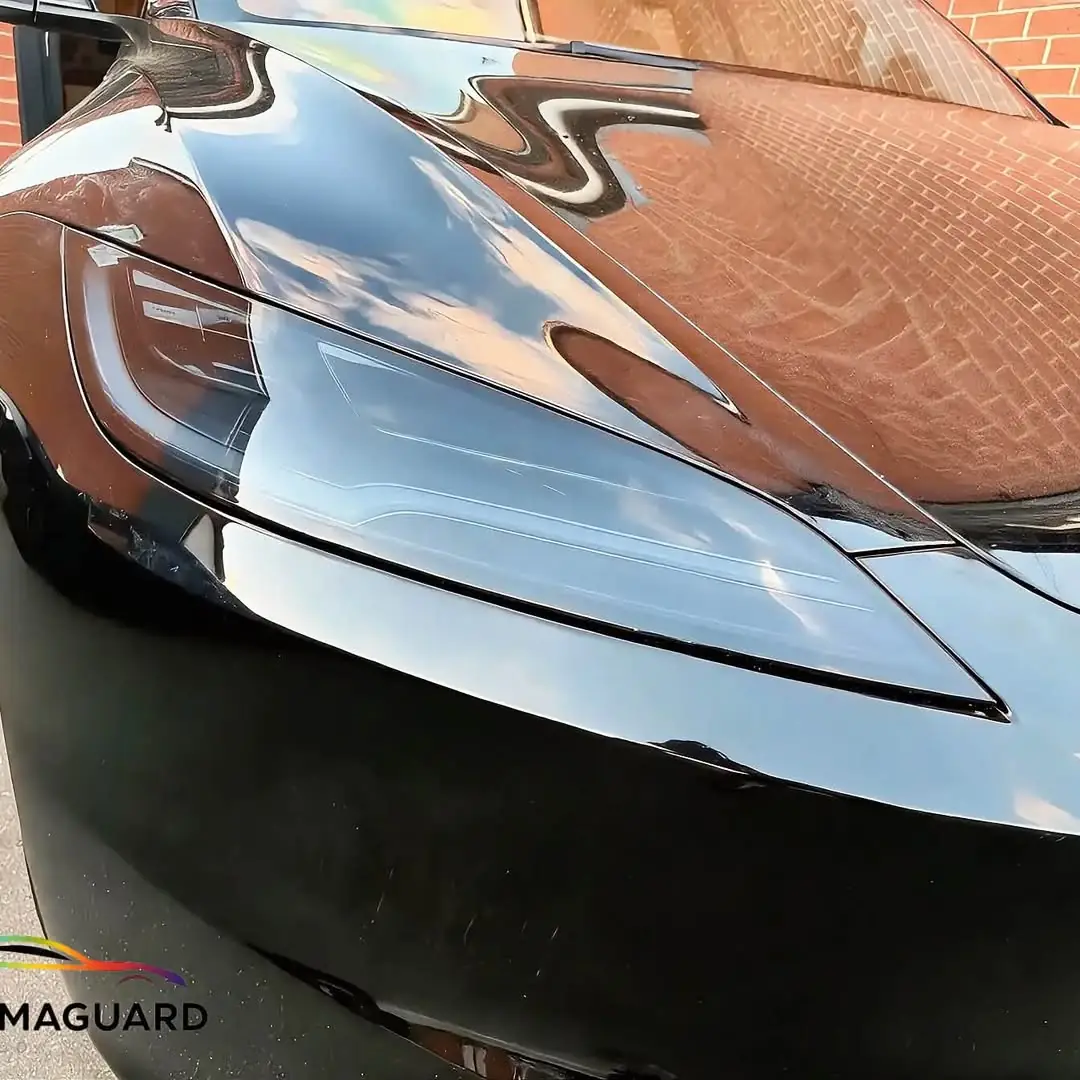Tesla headlight with smoked tint film